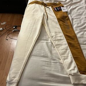 Mens XL fits more like a Large. Cream and light brown